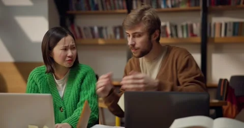 The guy grabs his head and doesnt know what to do while trying to solve a Stock Footage 313356639