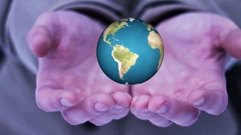 Guy hand holding a realistic Earth Video stock 69757525