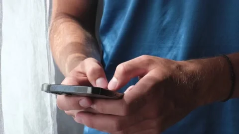 Guy hands typing message on mobile phone. Stock Footage 158806325