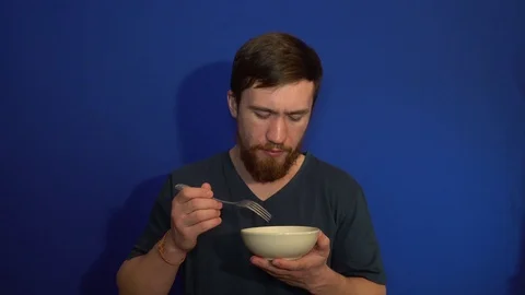 The guy is happy to eat dumplings 動画素材 124463075