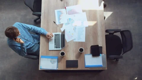 Guy has phone negotiation work Stock Footage 103100537
