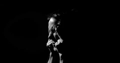 Guy has a very bad headache, rubs his temples, a psychological disorder Video stock 131719783