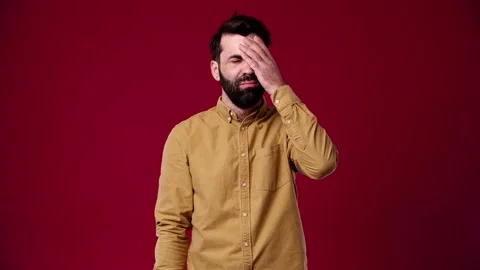 The guy has a very bad headache, he grabbed it Stock Footage 165621088