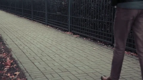 The guy in the hat is coming with a suitcase on the street Stock-Footage 80492826