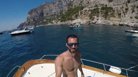 Guy Having Fun in Almafi Coast, Italy Stock Footage 79461304
