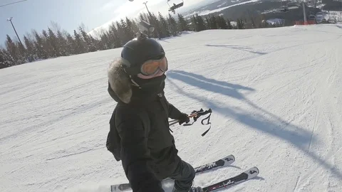 Guy having fun while skiing, recording himself with the camera Video stock 114227292