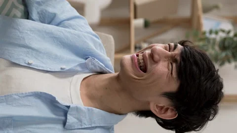 Guy having good laugh and turning up Stock Footage 219398017