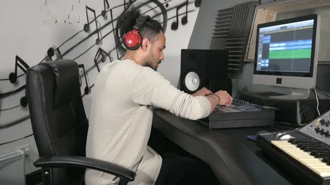 Guy with headphones in recording studio. Stock Footage 113197269