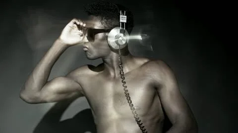 Guy with headphones sequence 4K Stock Footage 12249087