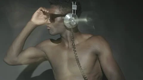 Guy with headphones sequence Stock Footage 12249031