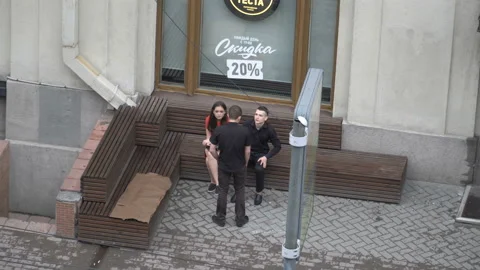 The guy held a knockout man in the street. Stock Footage 91113637