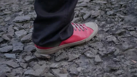 A guy is hiking in the mountains Video stock 254933141