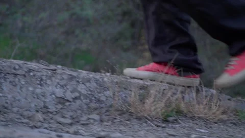 A guy is hiking in the mountains Stock Footage 254933407