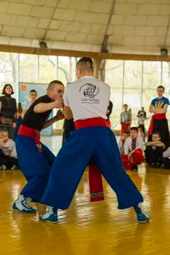 Guy hit the opponent with his right hand Stock Photos
