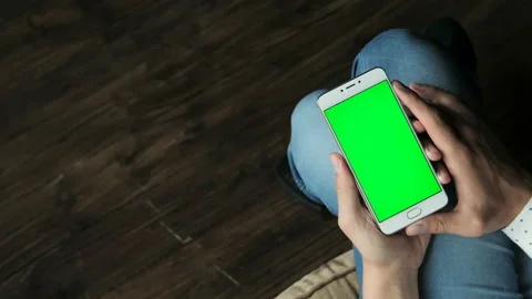 Guy hold cellular portable device with chromakey touchpad closeup point of view. Stock Footage 199492657