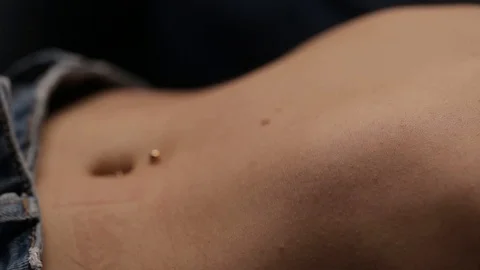 The guy holds an ice cube over the girl’s body. A married couple flirts Stock Footage 124904080