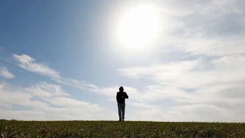 The guy in the hood runs towards the camera and jumps in front of it. Stock Footage 127640370