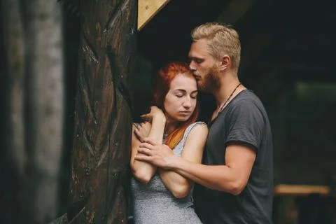 Guy hugging his girlfriend Stock Photos