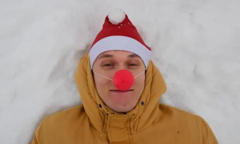 Guy in the image of Santa. Stock Photos