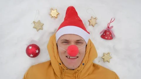 Guy in the image of Santa. Stock Photos