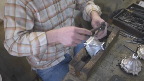 Guy inlaying on silver. Stock Footage 124657823