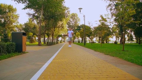 Guy jogging shows thumb up Stock Footage 104823877