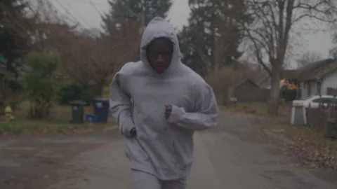 Guy Jogs In Street Outside Stock Footage 270324923
