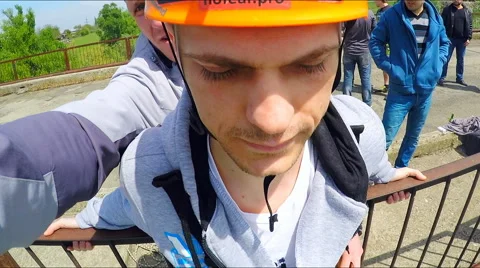 Guy jumping from the bridge facing forward Stock Footage 49912566