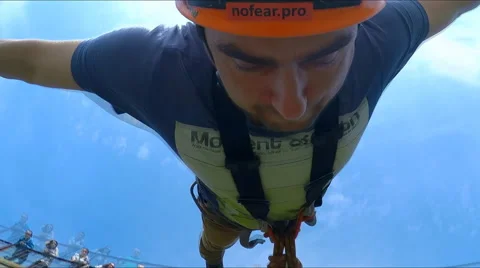 Guy jumping from the bridge facing forward  from Gopro   Hero 3 Stock Footage 49913212