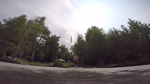 Guy jumping off dock sequence Stock Footage 52429605