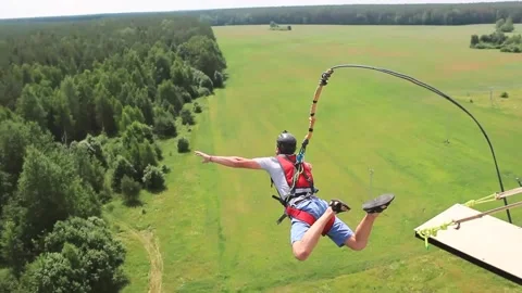 Guy jumping from a height Stock Footage 130737117