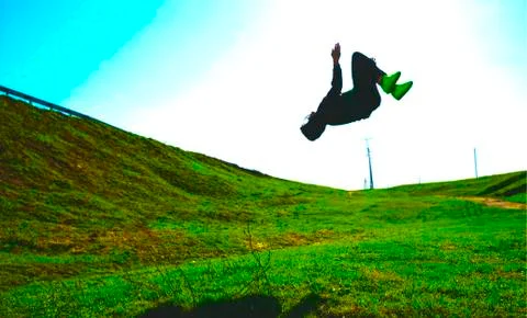 Guy jumping over his head Stock Photos