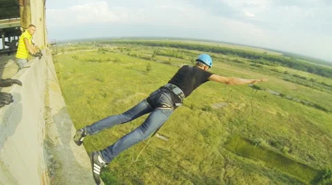 Guy jumping rolling over in a jump Stock Footage 68071310