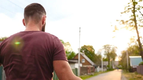 The guy is jumping rope at sunset. Slow motion Stock Footage 88911251