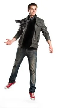 Guy jumps on the isolated background Foto stock