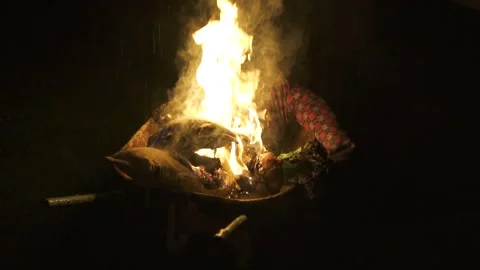 Guy jumps over bonfire Stock Footage 195301927
