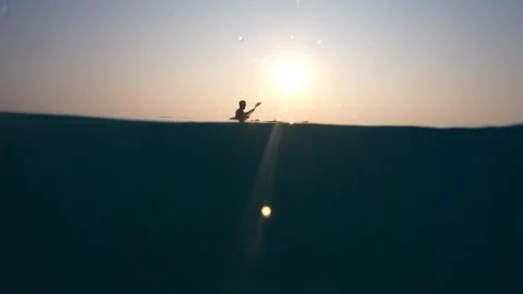 Guy In kayak on open deep blue sea  Stock Footage