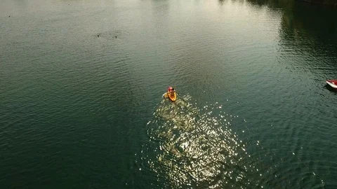 A guy kayaking at the Lake Stock-Footage 104801851