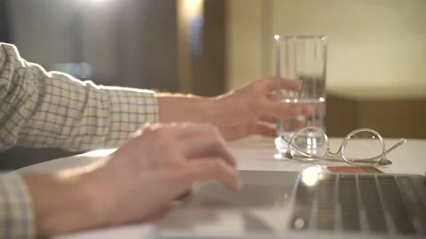 A guy with a laptop makes a card purchase Stock Footage 131511504