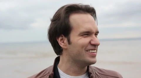 Guy  Laughs on Camera Ocean Background Vidéo 53836372