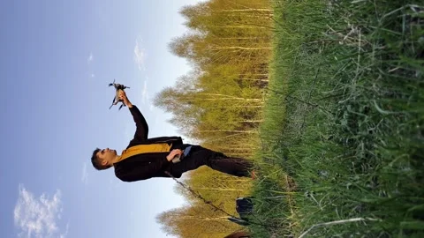 The guy launches the drone with his hands Stock Footage 248518028