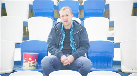 Guy leaving the stadium tribune Stock Footage 63745650