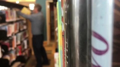 Guy in Library Blurred  Video stock 98097050