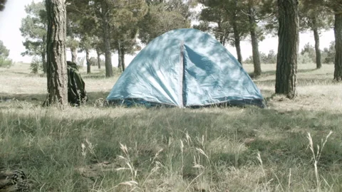 The guy lies in a tent resting Stock Footage 133816225