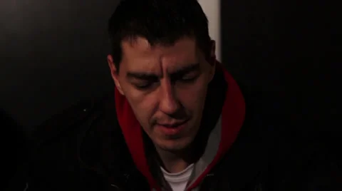 The guy lighting and smoking joint marijuana, close up shot Stock Footage 34366756