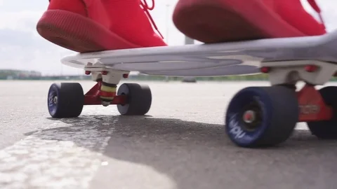 The guy on the longboard rides. Video stock 108059255