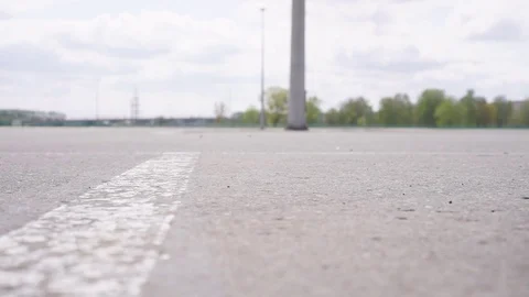 The guy on the longboard rides. Stock Footage 108059268