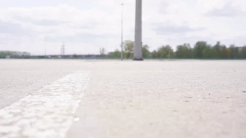 The guy on the longboard rides. Stock Footage 108059282