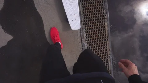 The guy on the longboard rides. Stock Footage 108059323
