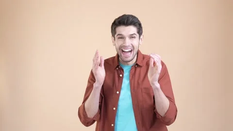 Guy look discount impressed scream fist up isolated pastel color background Stock Footage 169937110